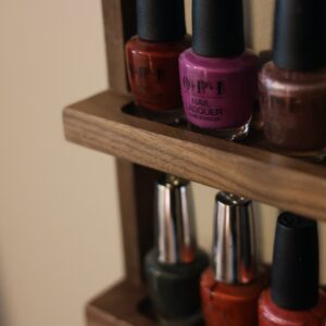 Beautiful handmade hanging nail polish rack easy to use nail polish rack customizable number of shelves. Solid hardwood essential oils rack